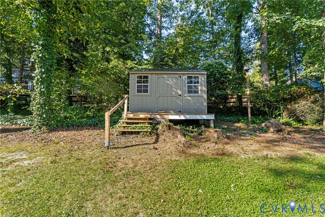 12831 Ashtree Road Midlothian, VA 23114 - Photo 37 of 45 a view of a house with a yard