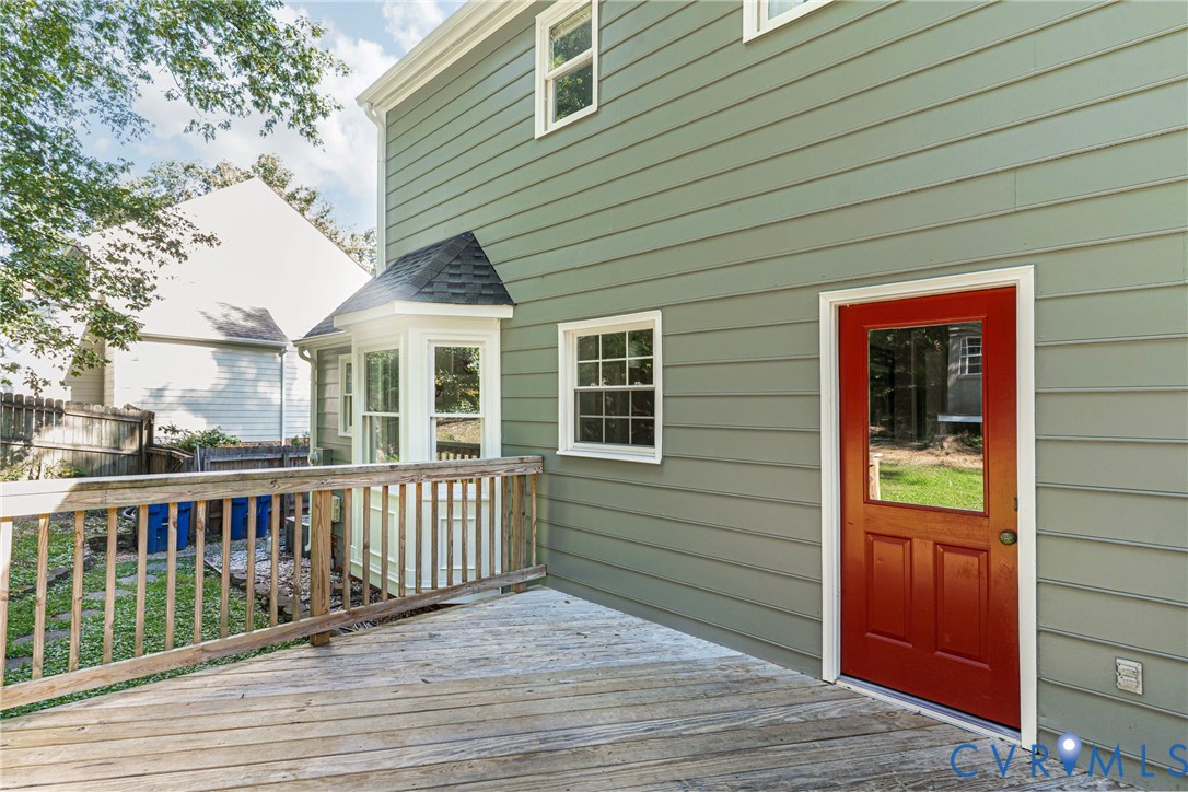 12831 Ashtree Road Midlothian, VA 23114 - Photo 43 of 45 a view of a house with a deck