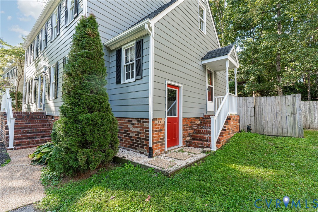 12831 Ashtree Road Midlothian, VA 23114 - Photo 45 of 45 a front view of a house with a yard