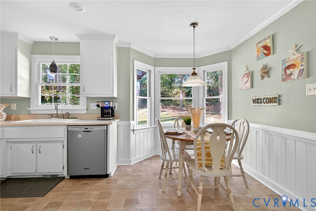 12831 Ashtree Road Midlothian, VA 23114 - Photo 7 of 45 a view of a dining room with furniture window and outside view