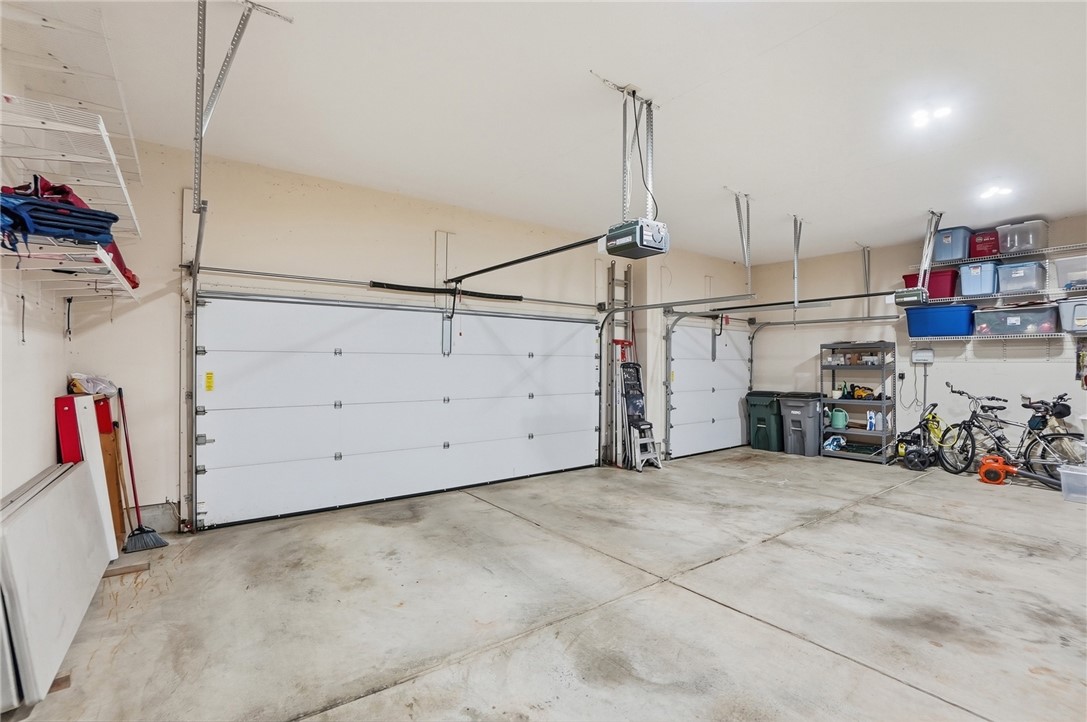 710 Governors Road Troy, OH 45373 - Photo 28 of 56 This spacious garage offers ample room for vehicles and organized storage solutions.