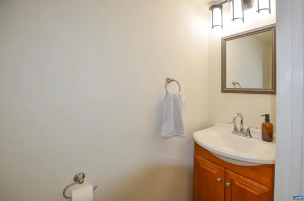a close view of a utility room with dryer and washer