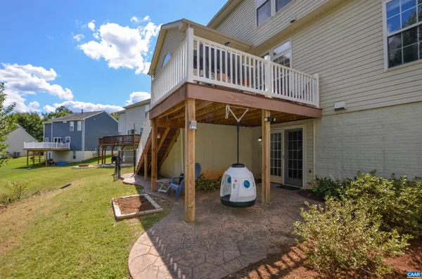 a view of a backyard of the house
