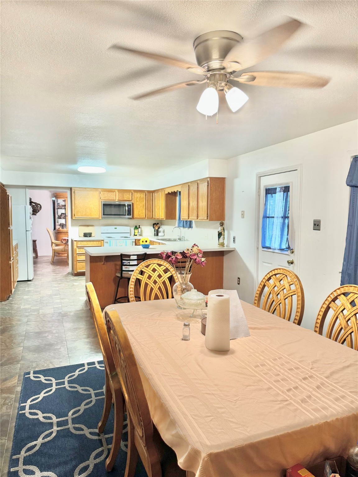 12420 Old Needville Fairchild Road Needville, TX 77461 - Photo 17 of 26 a view of a dining room and livingroom view