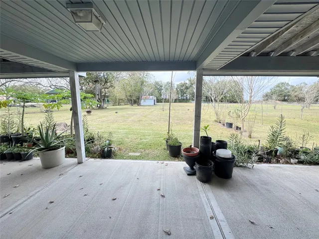 a view of swimming pool with outdoor seating