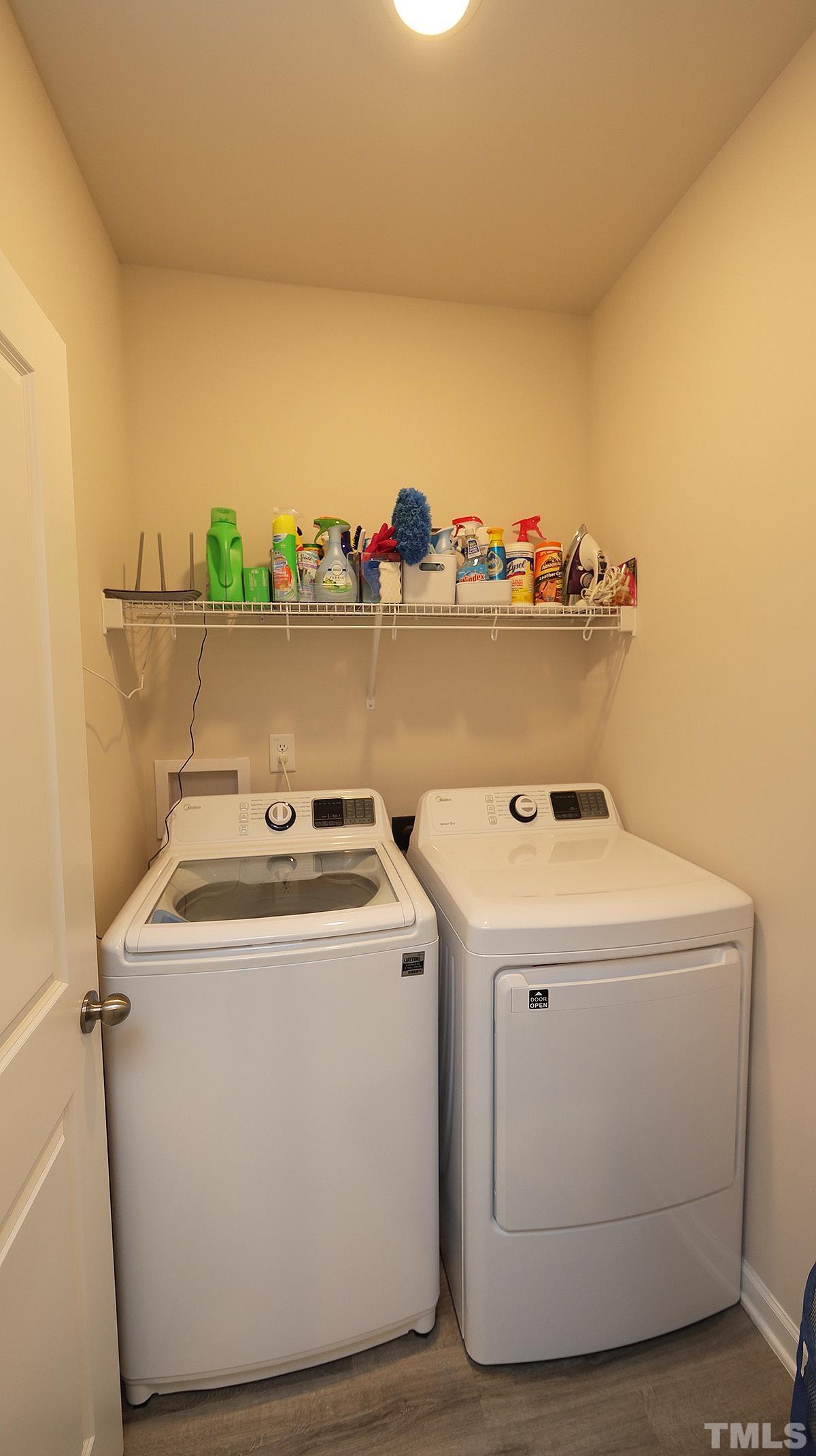 3705 Putman Road Raleigh, NC 27610 - Photo 8 of 19 a utility room with dryer and washer