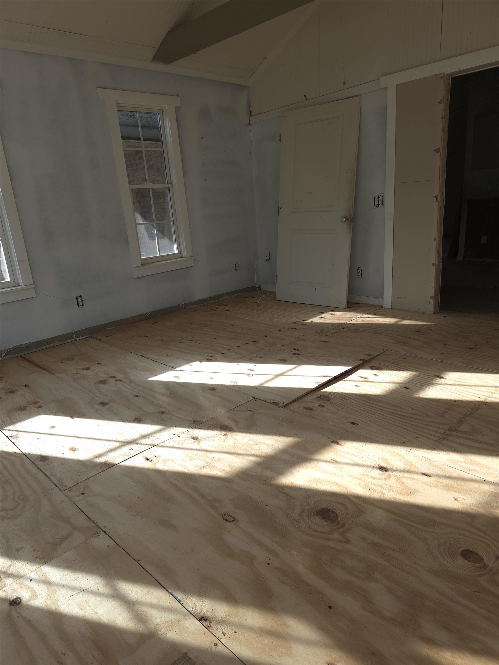 1795 Star Bluff Road Longs, SC 29568 - Photo 3 of 26 Spare room with healthy amount of natural light and lofted ceiling