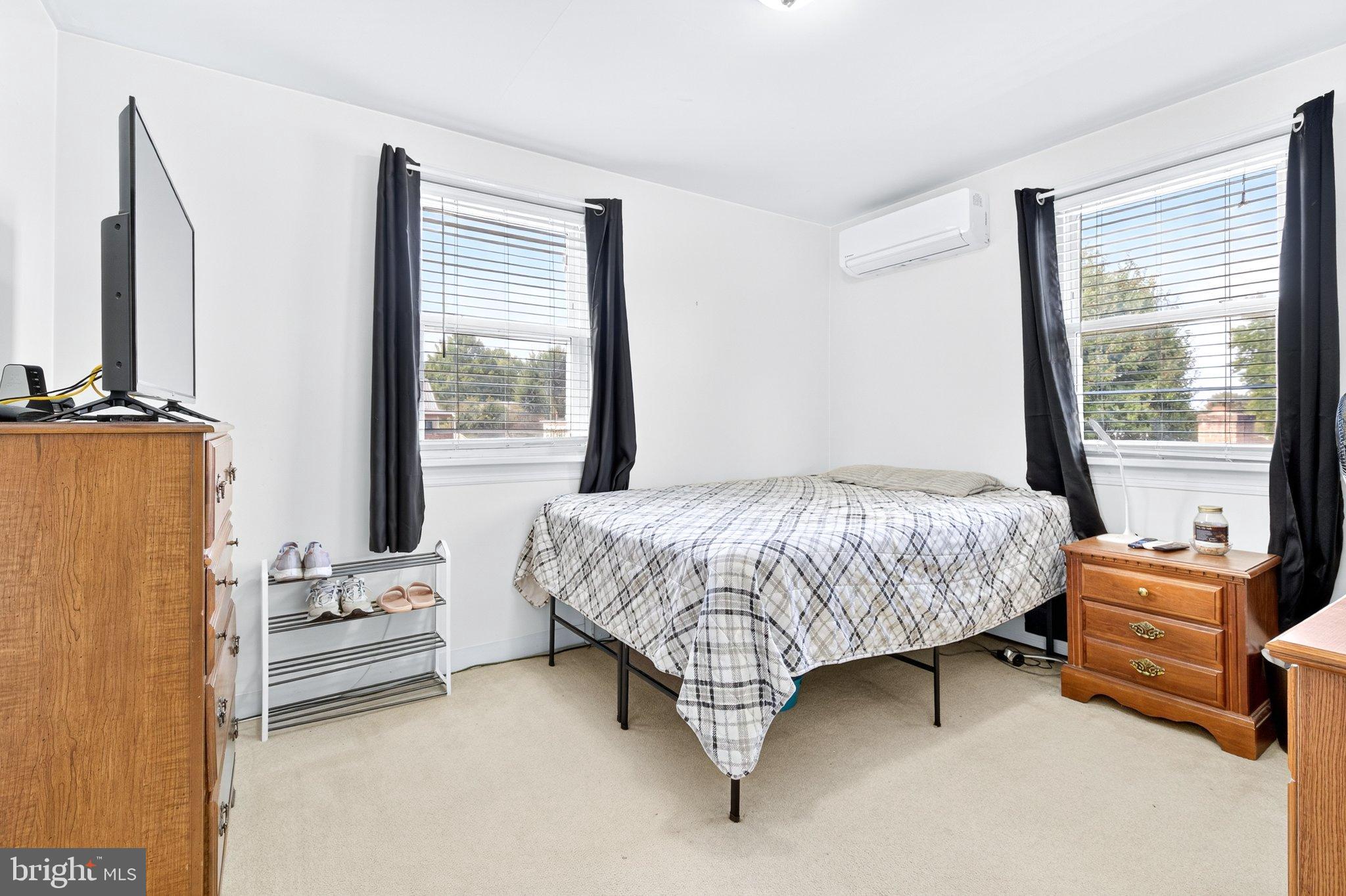 1025 Cornwall Road Lebanon, PA 17042 - Photo 17 of 36 a bedroom with a bed couch and a window
