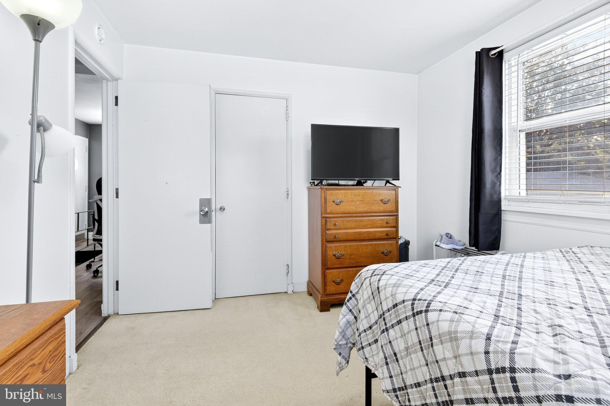 1025 Cornwall Road Lebanon, PA 17042 - Photo 18 of 36 a bedroom with a bed and a flat screen tv