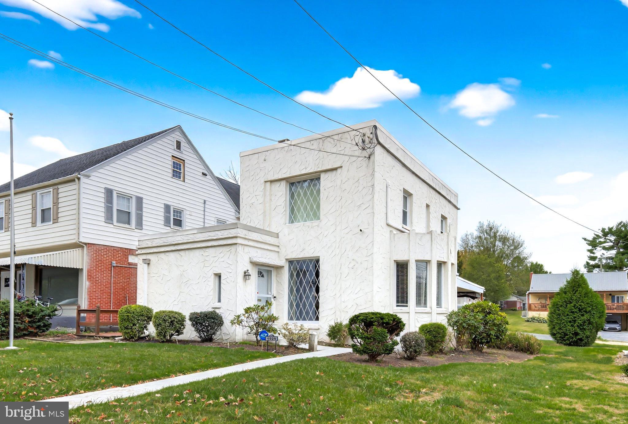 1025 Cornwall Road Lebanon, PA 17042 - Photo 2 of 36 a front view of a house with a garden