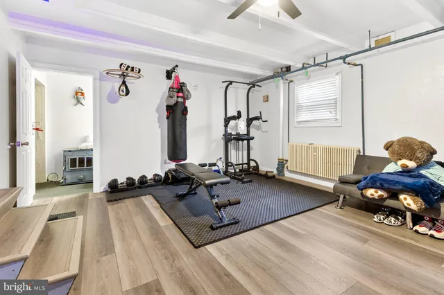 a view of a patio with table and chairs with wooden floor