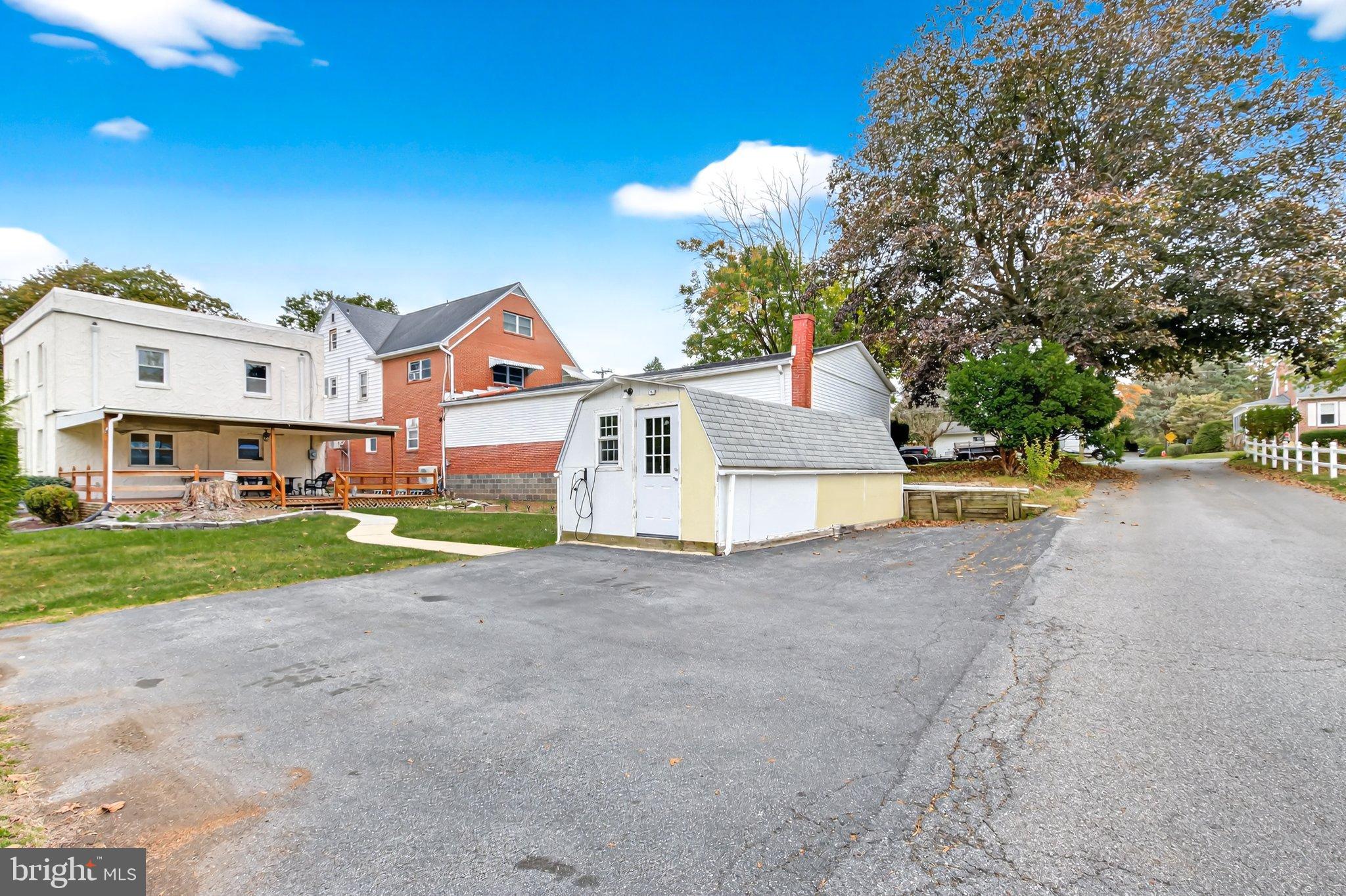 1025 Cornwall Road Lebanon, PA 17042 - Photo 34 of 36 a view of an house with backyard and a tree