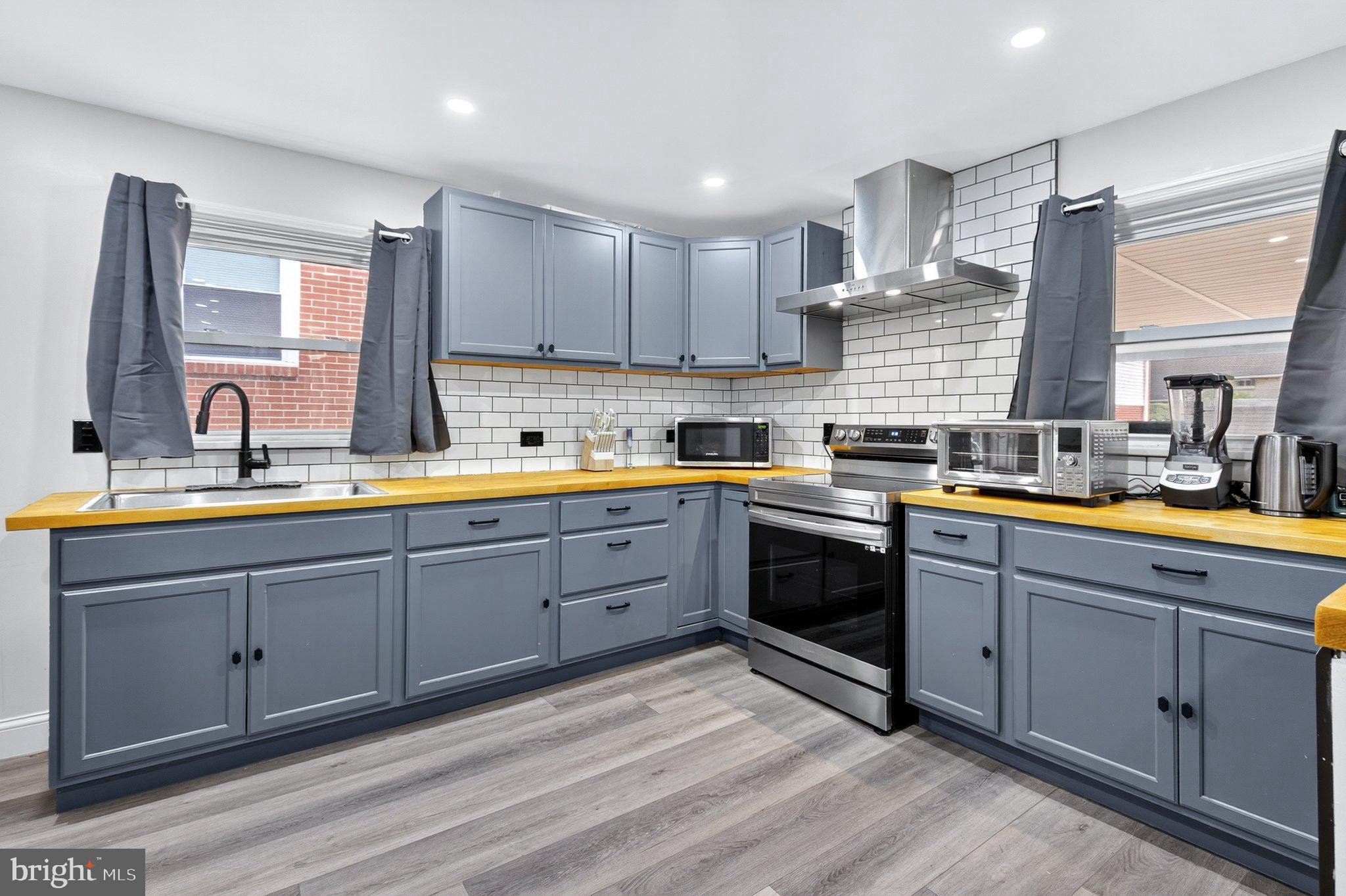 1025 Cornwall Road Lebanon, PA 17042 - Photo 4 of 36 a kitchen with sink cabinets and window