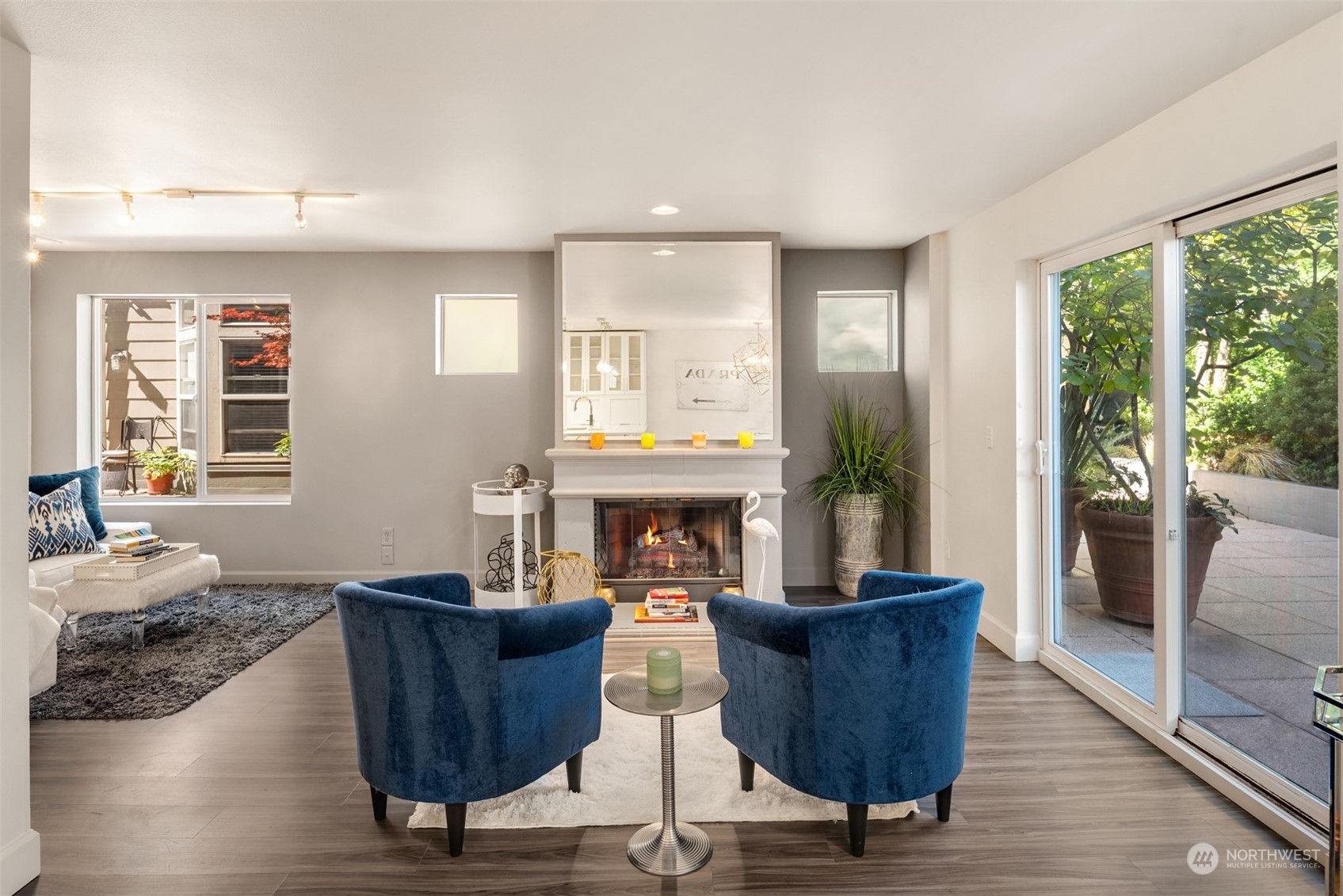 500 Aloha Street, Unit E111 Seattle, WA 98109 - Photo 12 of 25 a living room with couches and a fireplace