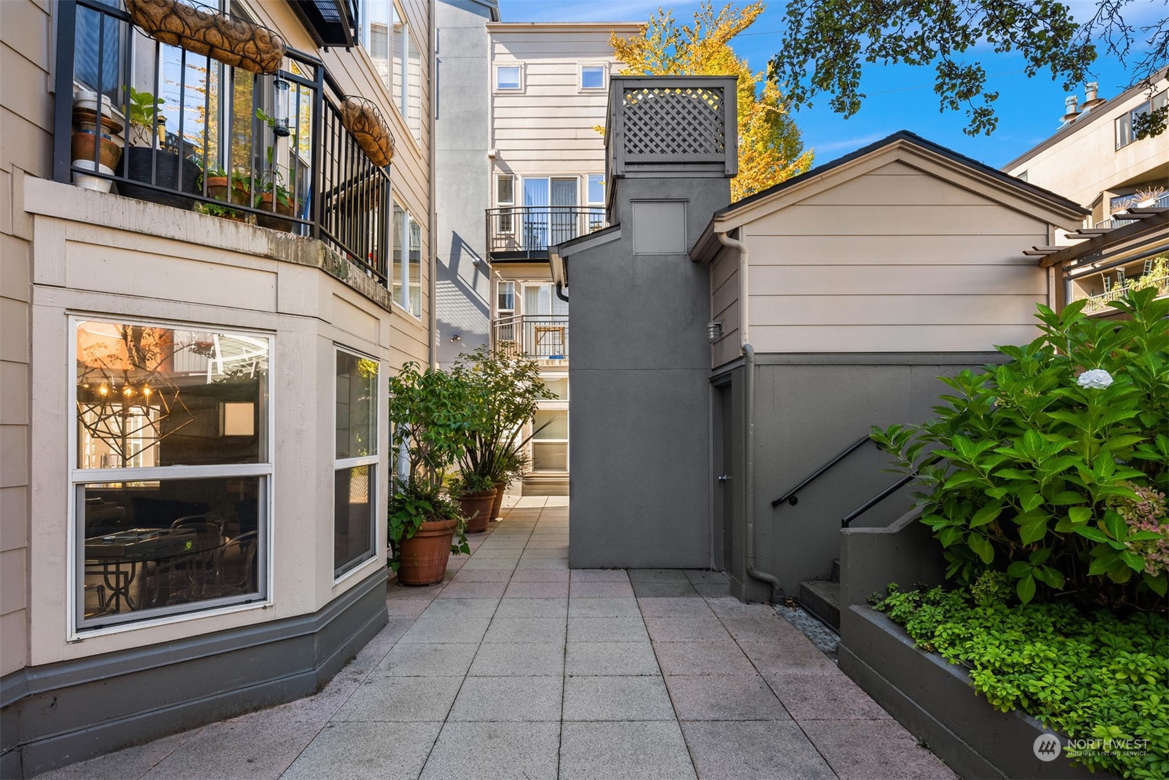 500 Aloha Street, Unit E111 Seattle, WA 98109 - Photo 22 of 25 a view of a house with many windows