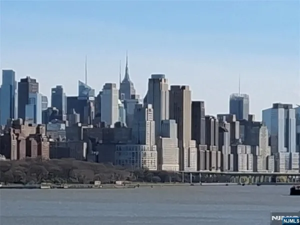 a view of a city with tall buildings