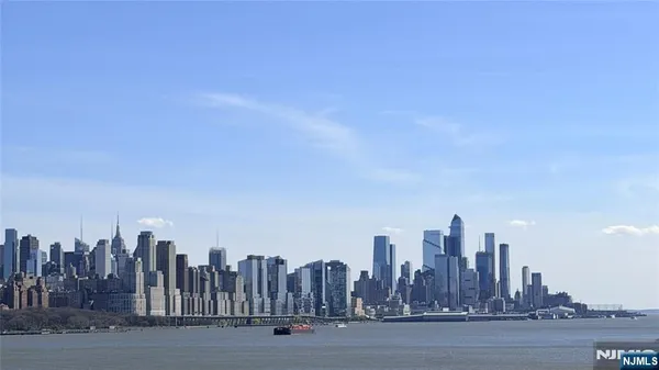 a view of a city with tall buildings in the background