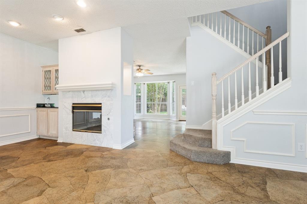 4709 Portrait Lane Plano, TX 75024 - Photo 14 of 22 Upstairs, retreat to 3 spacious bedrooms and 2 full bathrooms.