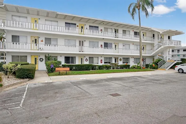 a front view of a building with street view