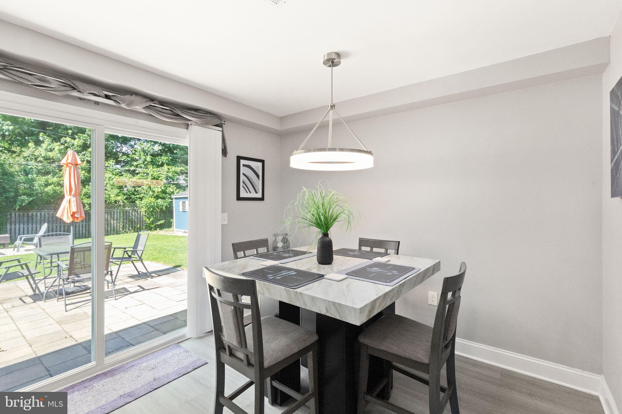 814 Foxwell Road Joppa, MD 21085 - Photo 8 of 21 a view of a dining room with furniture window and outside view