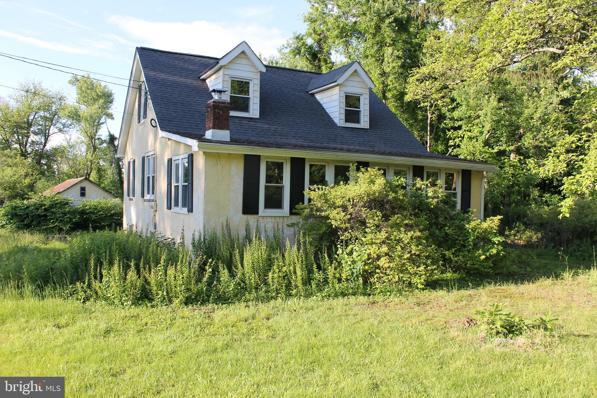 2042 Upper Ridge Road Green Lane, PA 18054 - Photo 2 of 5 a view of a yard in front of house