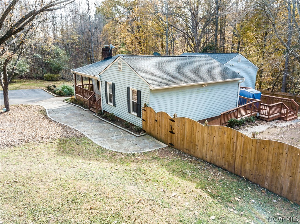 4217 Broad St Road Gum Spring, VA 23065 - Photo 1 of 39 a view of a house with wooden fence