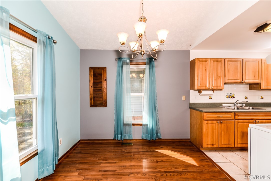 4217 Broad St Road Gum Spring, VA 23065 - Photo 11 of 39 a view of a kitchen with a sink and a window