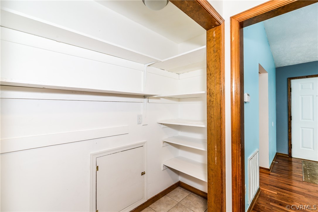 4217 Broad St Road Gum Spring, VA 23065 - Photo 13 of 39 a view of walk in closet with empty racks
