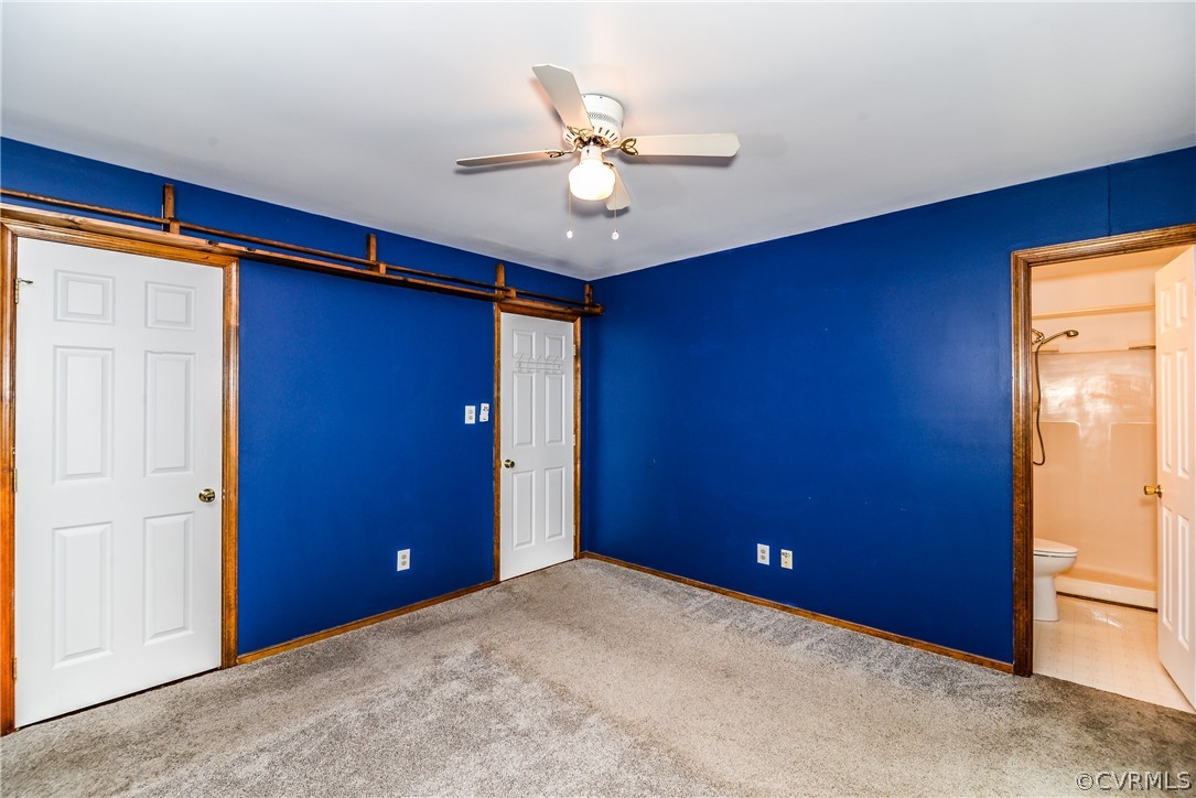 4217 Broad St Road Gum Spring, VA 23065 - Photo 17 of 39 a view of an empty room with a ceiling fan and window