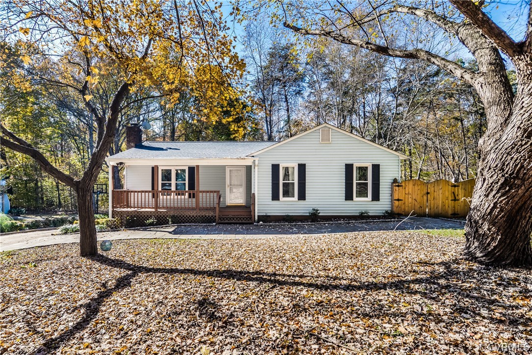 4217 Broad St Road Gum Spring, VA 23065 - Photo 2 of 39 a view of a white house with a white fence