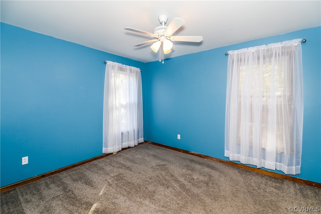 4217 Broad St Road Gum Spring, VA 23065 - Photo 28 of 39 an empty room with windows and fan