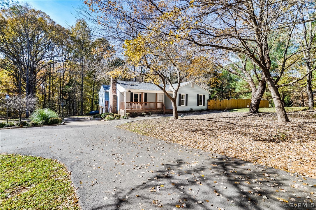 4217 Broad St Road Gum Spring, VA 23065 - Photo 37 of 39 a front view of a house with large trees