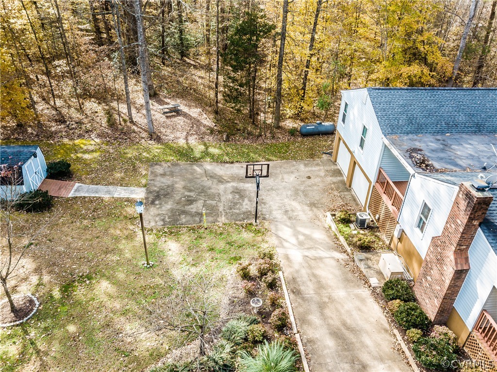4217 Broad St Road Gum Spring, VA 23065 - Photo 5 of 39 a view of yard along with trees