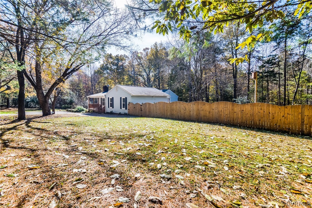 4217 Broad St Road Gum Spring, VA 23065 - Photo 6 of 39 a backyard of a house with trees