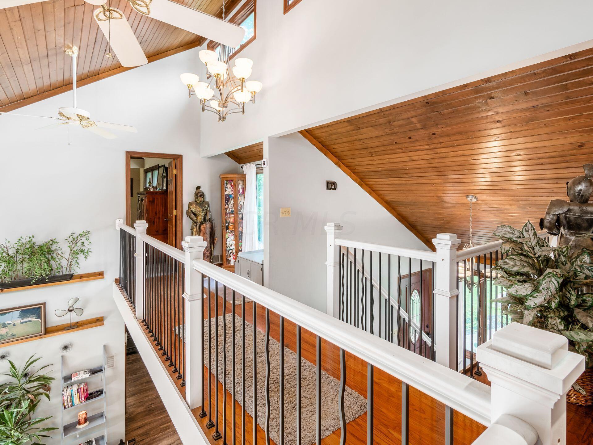 4150 Harlem Road Galena, OH 43021 - Photo 38 of 73 Beautiful hardwood floors and wood shiplap ceiling.