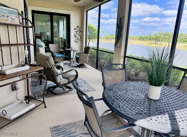 10470 Casella Way, Unit 102 Fort Myers, FL 33913 - Photo 12 of 18 a view of a dining room with furniture window and outside view