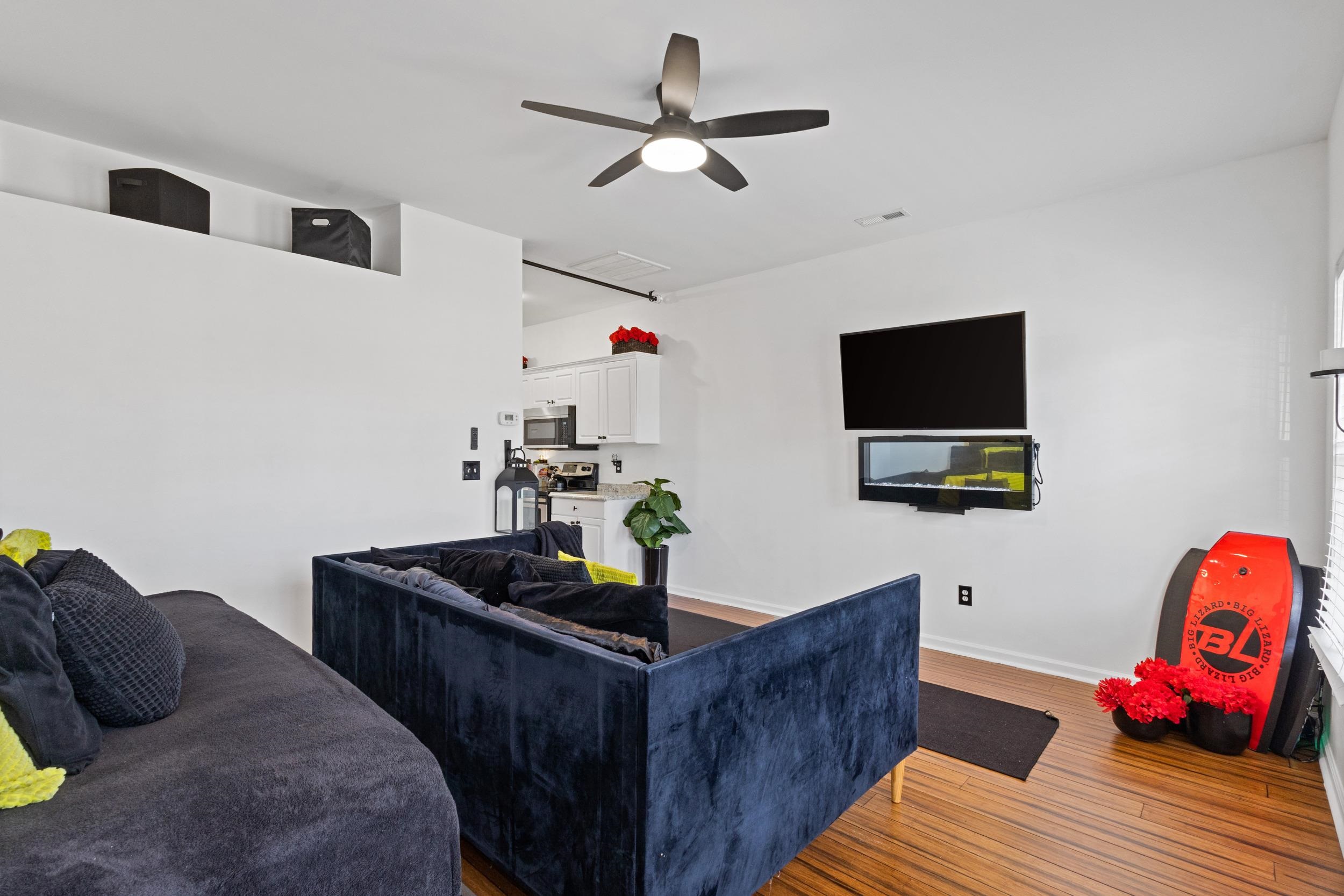 141 Addison Cottage Way Murrells Inlet, SC 29576 - Photo 5 of 17 Living room featuring light wood-type flooring and a ceiling fan