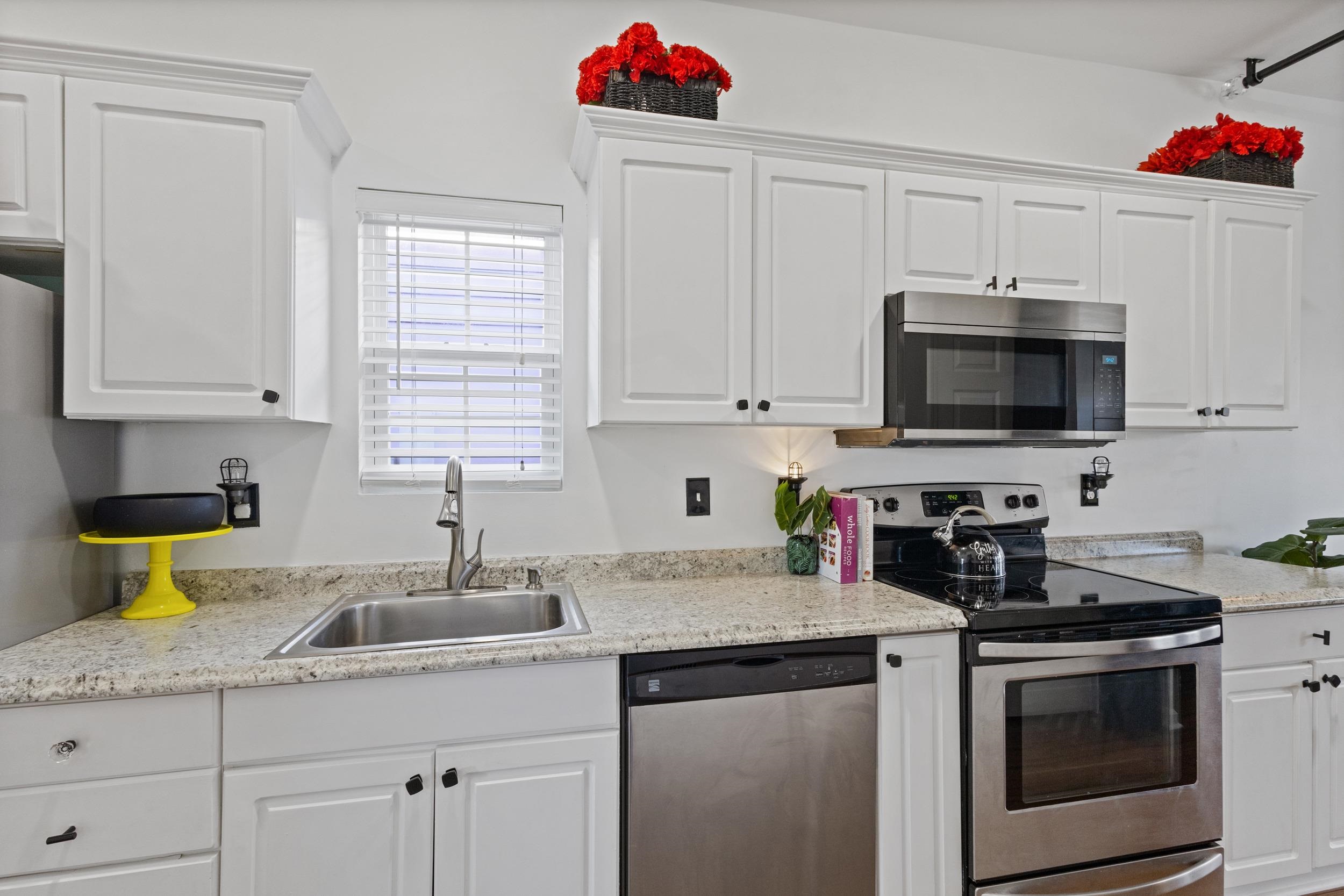 141 Addison Cottage Way Murrells Inlet, SC 29576 - Photo 8 of 17 Kitchen featuring stainless steel appliances, white cabinets, and light stone countertops