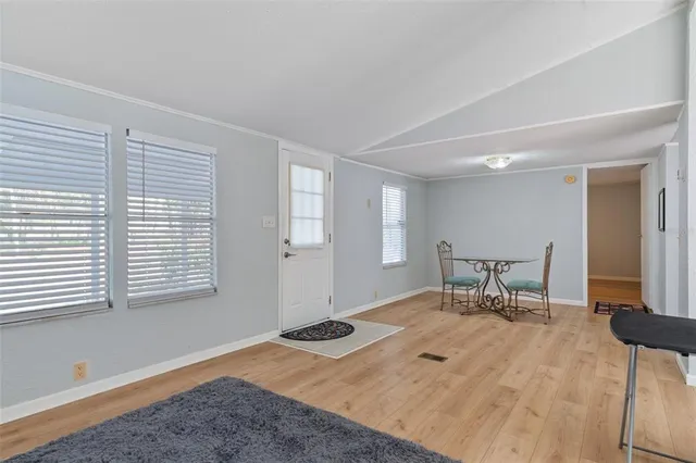 a workspace with furniture and window