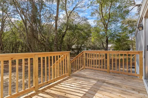 a view of a wooden roof deck