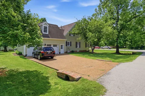 a house view with a garden space