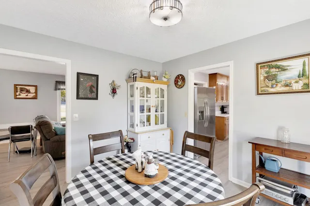 a view of a livingroom with furniture and lounge chair