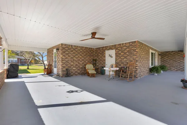 a view of a livingroom with a lounge chair