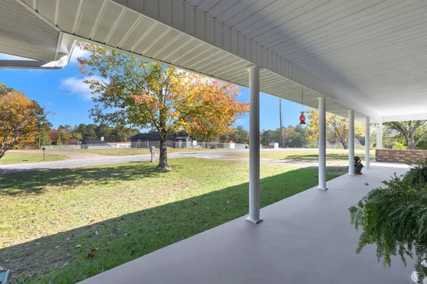 a view of a garden with an outdoor space
