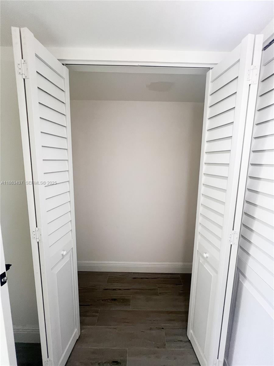 769 Jeffery Street, Unit 2205 Boca Raton, FL 33487 - Photo 16 of 30 a view of wooden floor and staircase