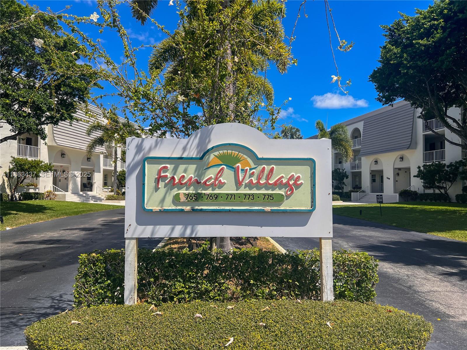 769 Jeffery Street, Unit 2205 Boca Raton, FL 33487 - Photo 29 of 30 a sign on the side of a road