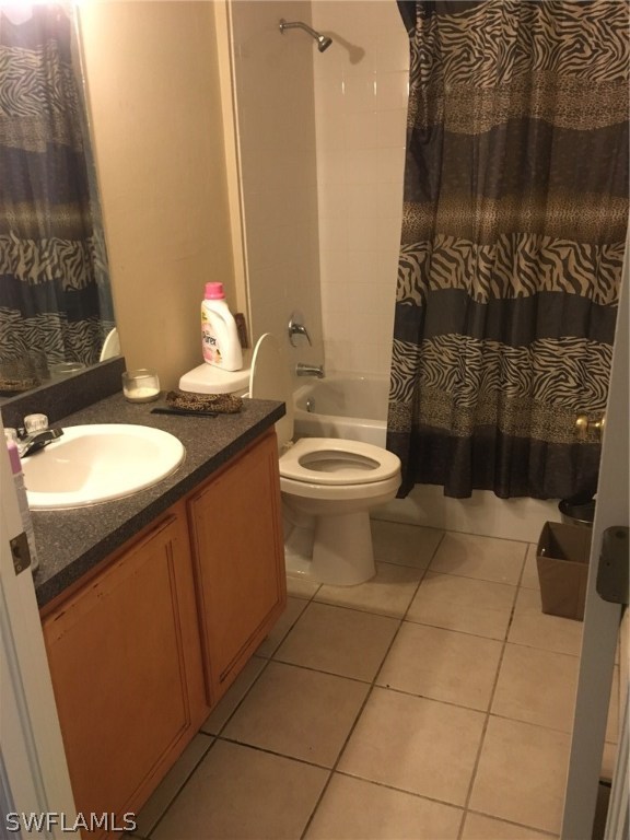 941 Homestead Road South, Unit 941/943 Lehigh Acres, FL 33974 - Photo 8 of 19 a bathroom with a sink toilet and shower