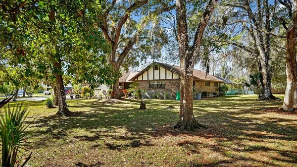 a view of a swimming pool with a porch