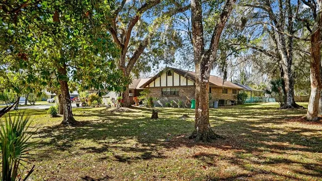 a view of a swimming pool with a porch