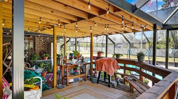 a view of balcony with outer view and glass windows